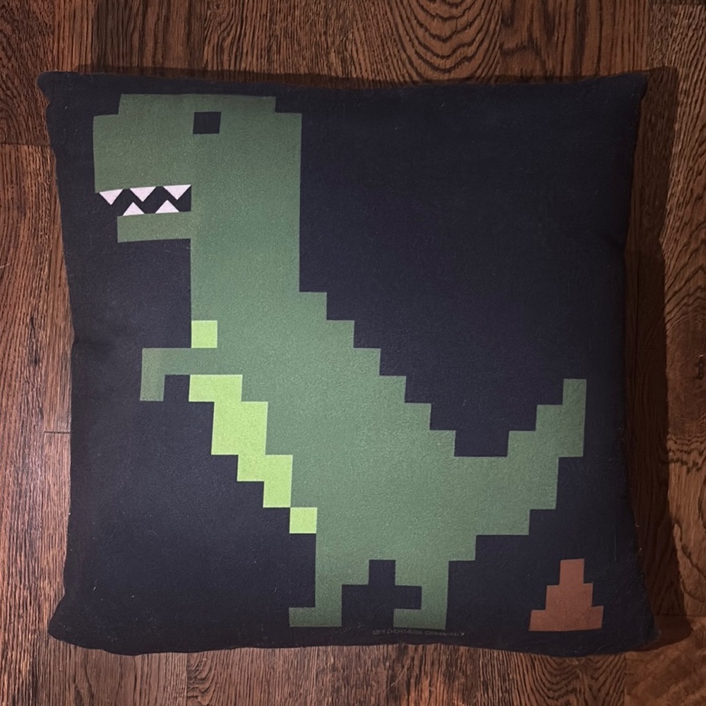 Green and Black Pixel Dinosaur Pillow